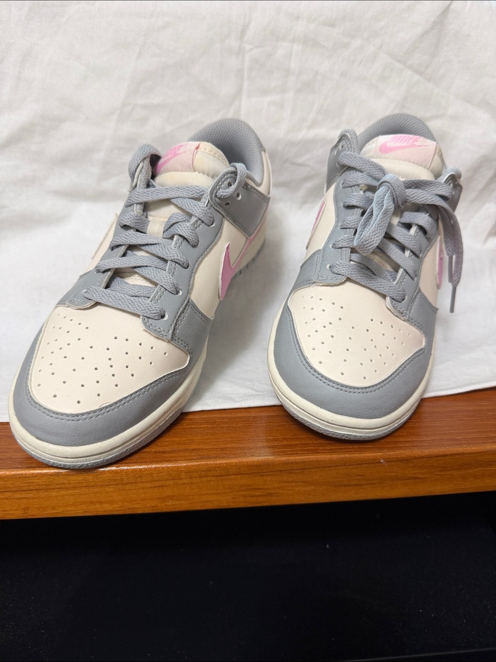 Nike Low-Top Sneakers in Gray, Cream & Pink Swoosh
